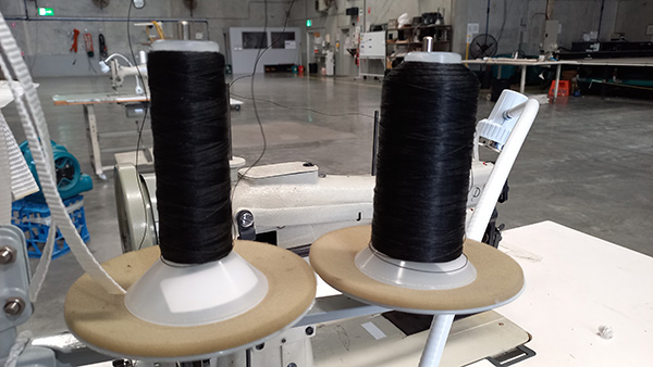 ePTFE thread on a spool in factory ePTFE thread on a spool in factory