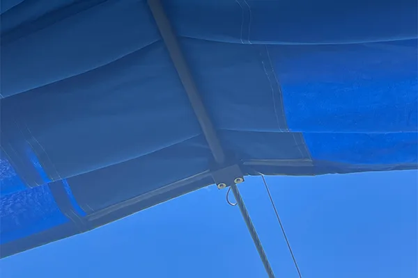 Retractable-bowling-green-safety-measures A suntamer Retractable Bowling Green Shade in Aqua Blue