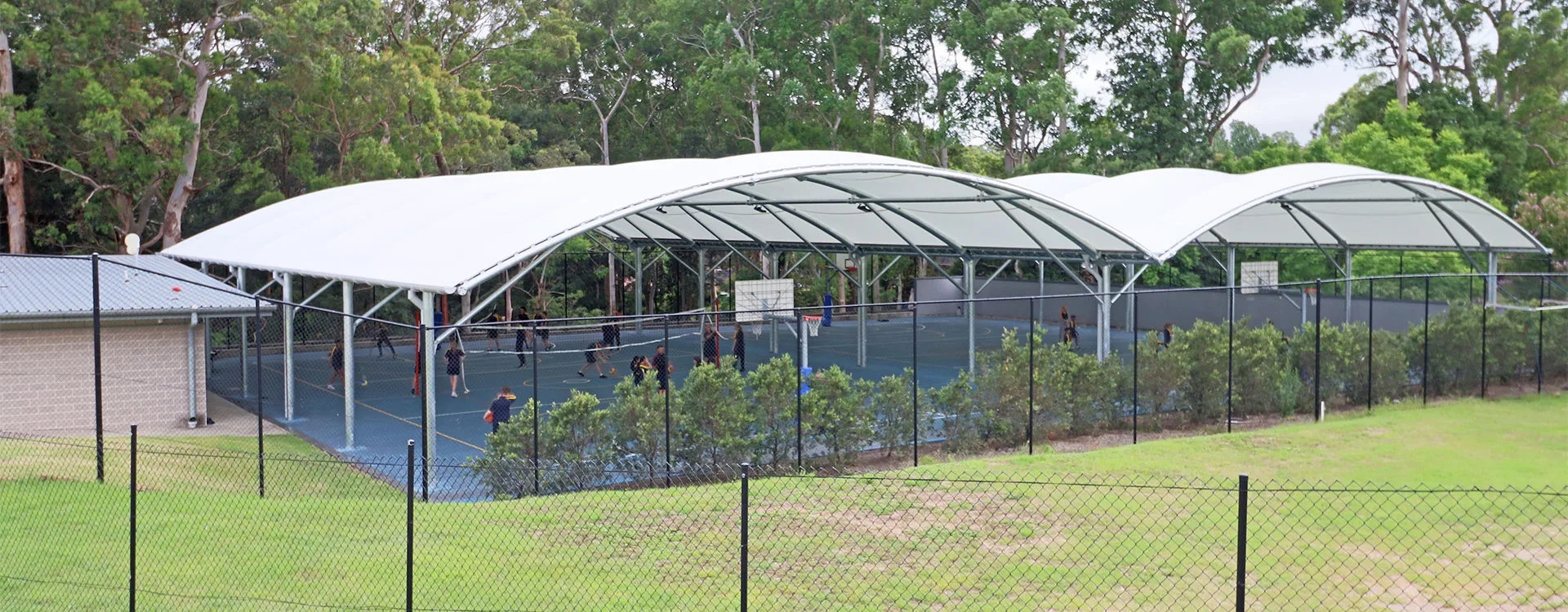 Sports Court Roof | How a Sports Court Roof Can Make A HPE Teacher’s Day Easier A school sports court roof